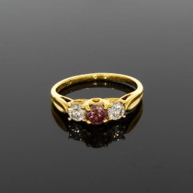 0.33 Carat Natural Pink / Purple & 2 0.25ct Natural White Brilliant Cut 18ct Yellow Gold Trilogy Ring