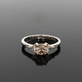 0.67 Carat G Colour SI2 Clarity Natural Pink Brilliant Cut & 0.15ct Trap Cut 18ct White Gold Ring